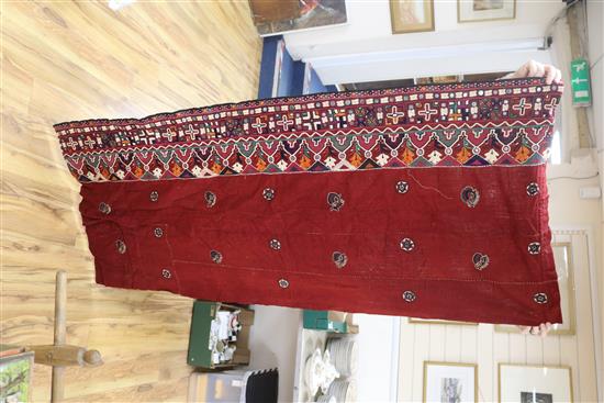 A collection of 19th century Indian silk embroidered and woven textiles